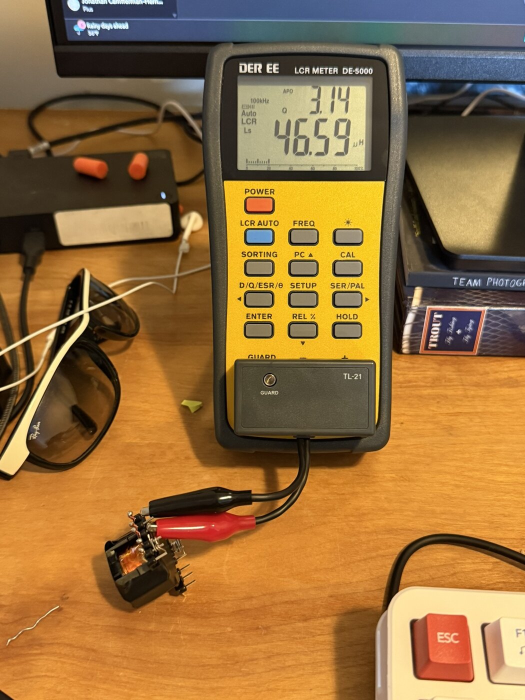 Meter photograph documenting a leakage inductance measurement on the flyback transformer